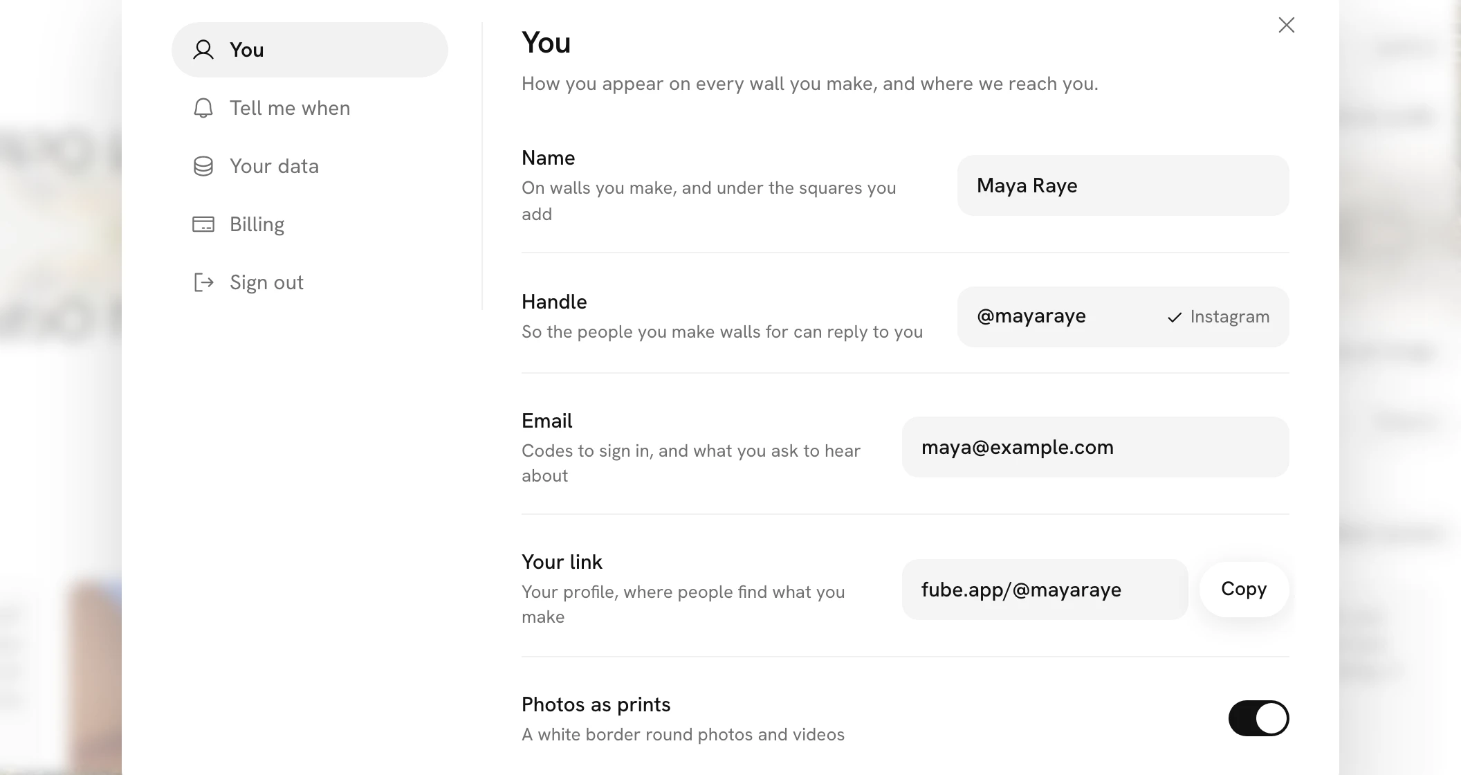 Settings open in the middle of the screen, with the wall's page it was opened from blurred behind it