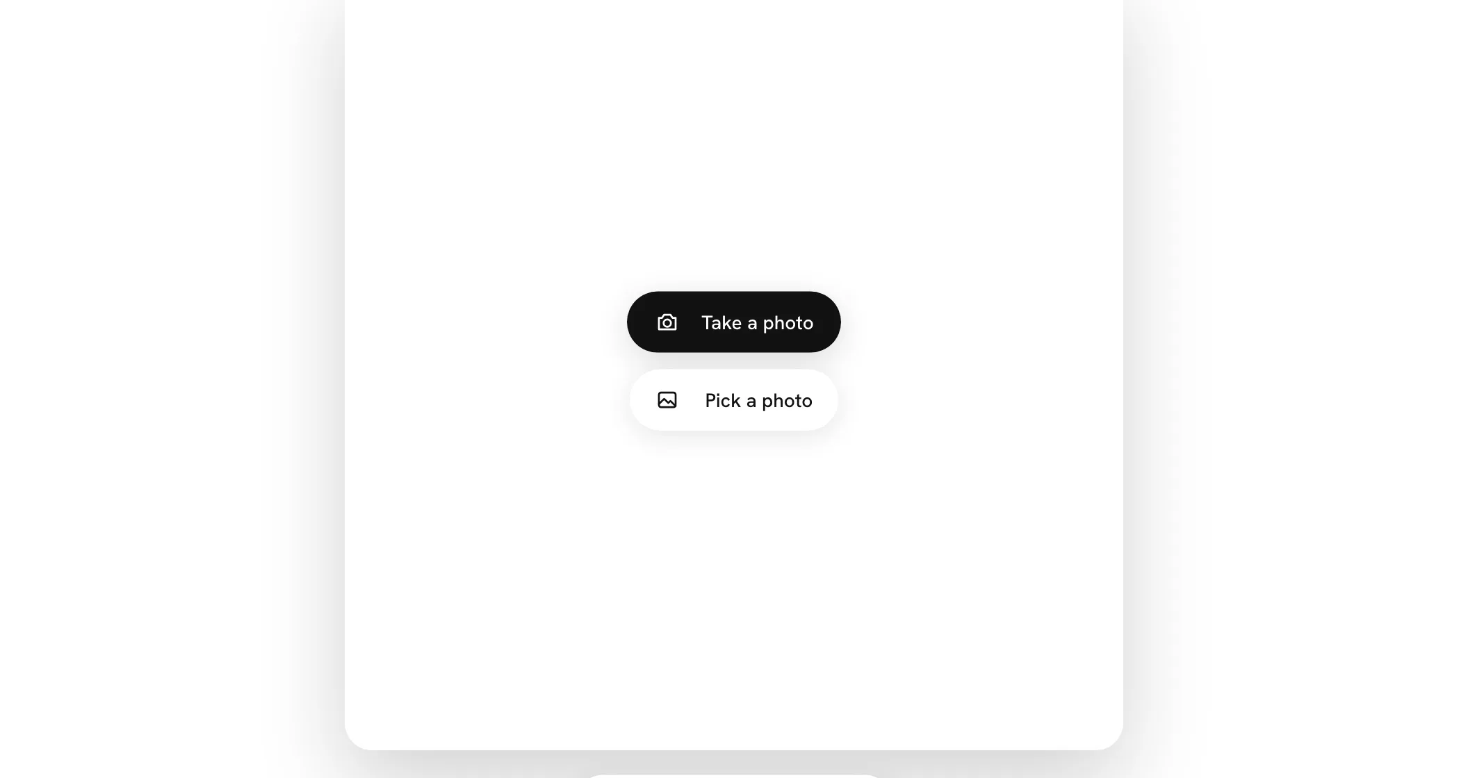 An empty square with two choices in the middle: Take a photo in black, Pick a photo under it in white